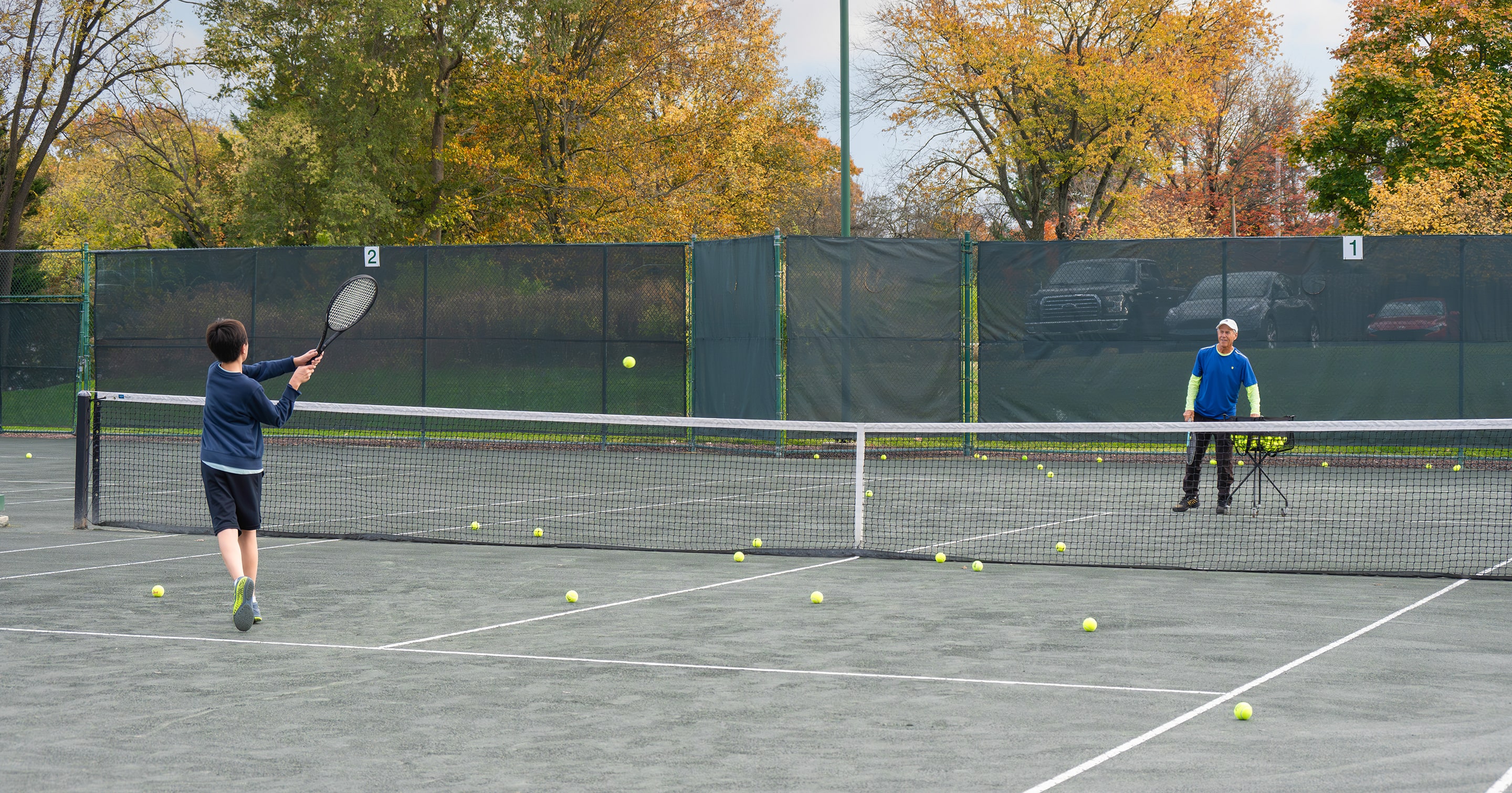 Young tennis player practicing